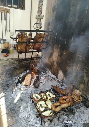 Una foto de Costillar a la llama
