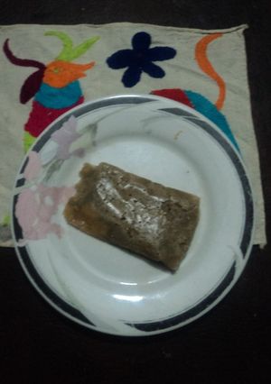 Una foto de Tamal Barroco de pollo con piloncillo y especias de oriente. Jalisco México