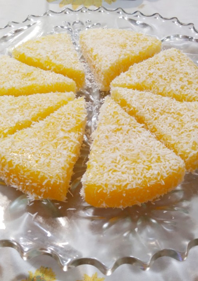 Una foto de "Pastel de naranja, limón y coco"