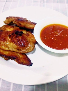 A picture of Pan grilled chicken and pepper sauce.