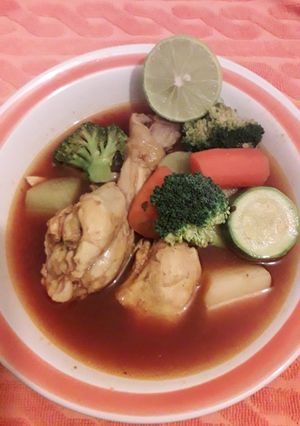 A picture of Caldo de Pollo (Red Chicken Soup).