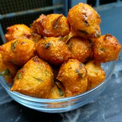 A picture of Ponnugulu (leftover idli batter).