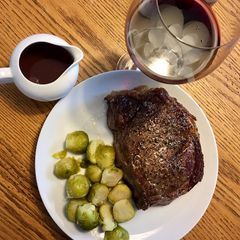 A picture of Rib Roast / Prime Rib with Sage Red Wine sauce.