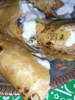 A picture of Achari Potato Paratha Roll.