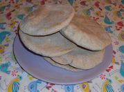 Una foto de pan pita integral