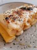 Rigatoni gratinados rellenos de brandada de bacalao