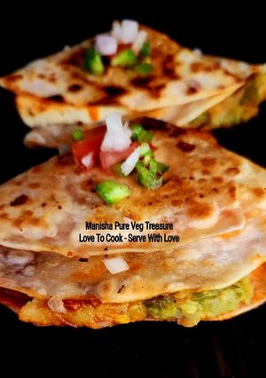 A picture of Aloo Matar Tikki Paneer Schezwan Tortilla Quesadilla.