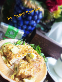 A picture of Cheese bread omelette sandwich.