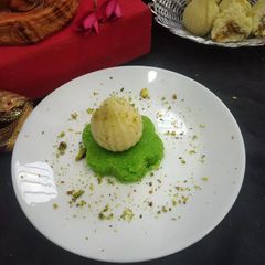 Fresh Fruit Pistachio Modak A picture of Fresh Fruit Pistachio Modak.