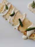 Crespelle fiorentine con fonduta di taleggio e asparagi