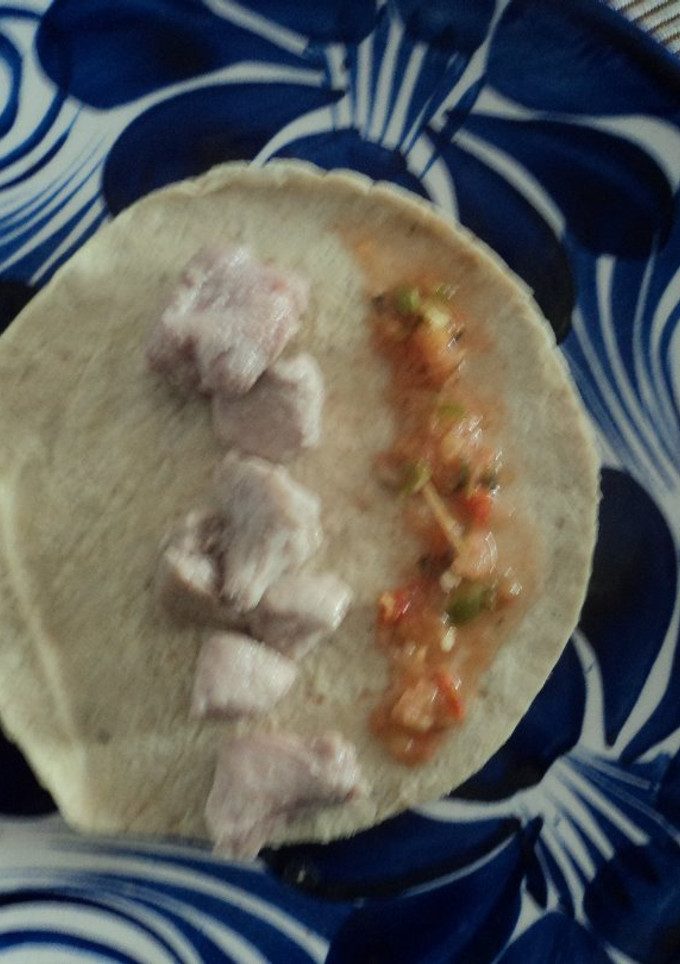 Una foto de Taquito de cerdo al pulque con epazote rancho el Pirul