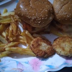 A picture of Chicken burger with cheese.