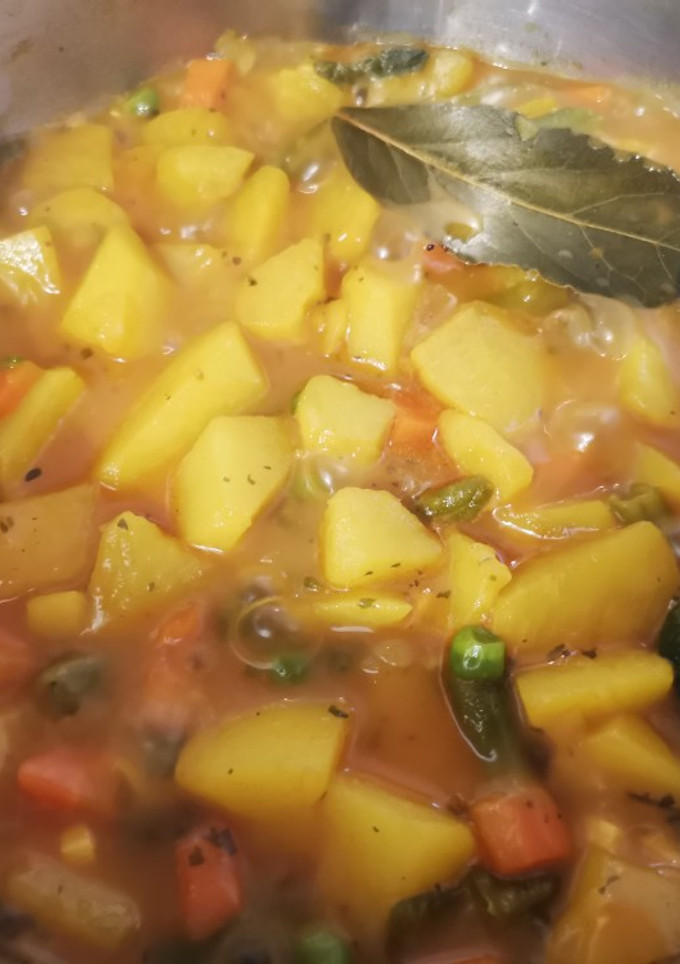 Una foto de Papas Viudas con Menestra