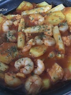 Una foto de Migas de bacalao con gambas y espárragos blancos