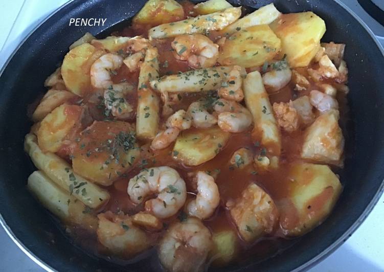 Migas de bacalao con gambas y espárragos blancos
