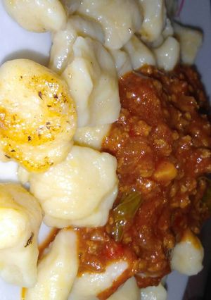 Una foto de Ñoquis con salsa boloñesa
