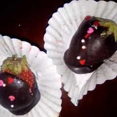 A picture of Chocolate coated strawberries.