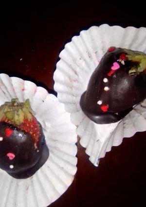 A picture of Chocolate coated strawberries.