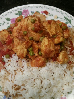 A picture of Chicken with tomatoes.