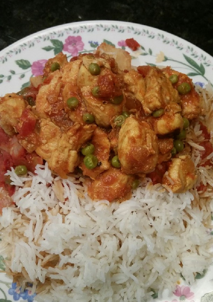 A picture of Chicken with tomatoes.