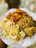 Mandi rice with coleslaw and plantain