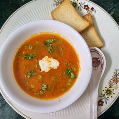 A picture of Tomato Lentil and Green Peas Soup.