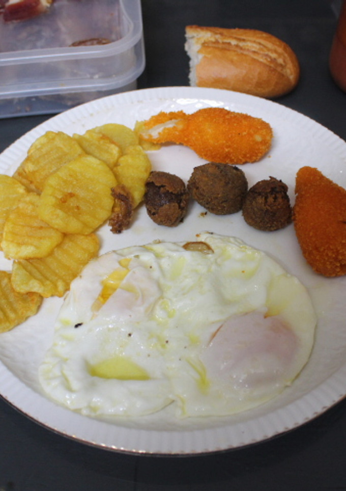 Una foto de Huevos fritos con fritoleo
