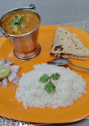 A picture of Mushroom Masala in red gravy.