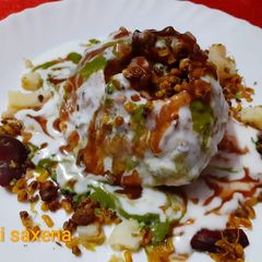 Rajasthani Colourful Shahi Raj Kachori Chaat A picture of Rajasthani Colourful Shahi Raj Kachori Chaat.