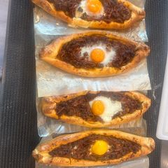 A picture of Turkish Pide - Boat Pizza - so cool and kids will love it :).