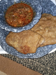 A picture of Pateera with carrots sauce.