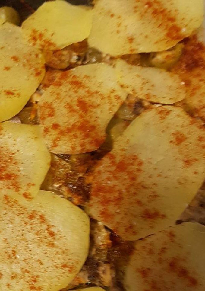 Una foto de Pastel de papás y sardinas
