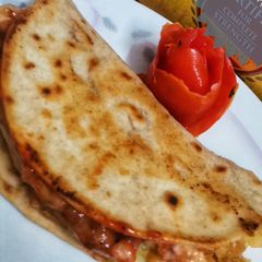 A picture of Potatoes cheesy Tacos.