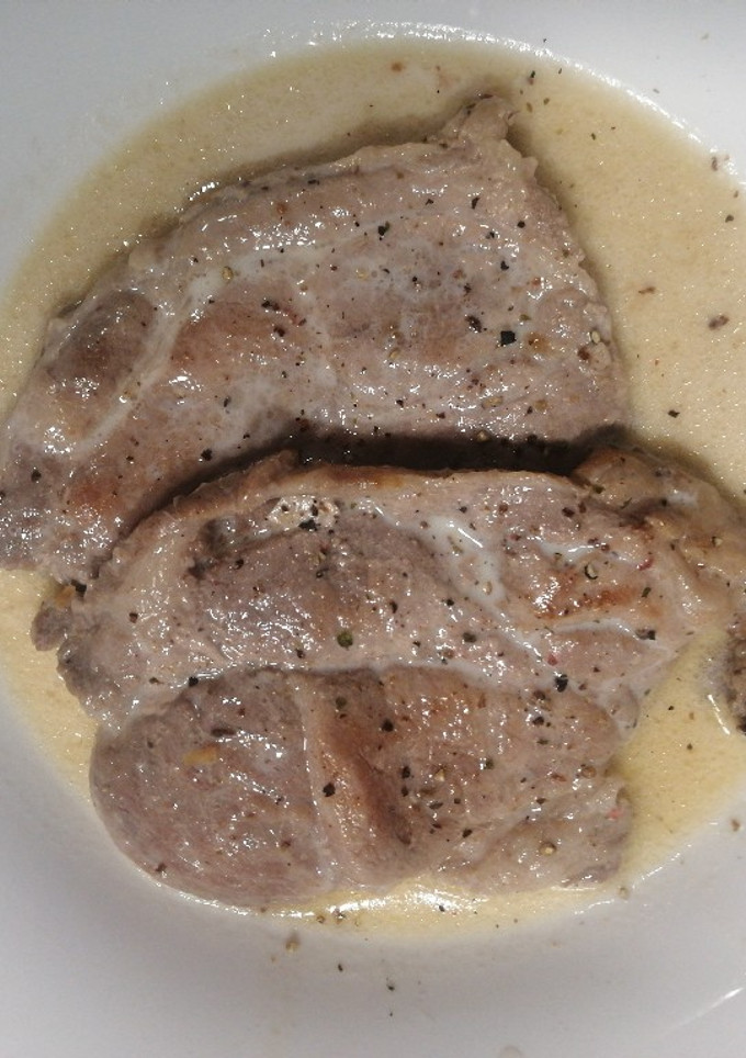 Una foto de Chuletas de cerdo en salsa de leche