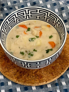 A picture of Knoephla Soup (Creamy chicken soup with potatoes and dumplings).
