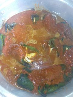 Una foto de Chiles rellenos en adobo sin capear a la mario, s