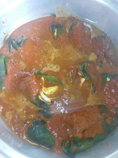 Una foto de Chiles rellenos en adobo sin capear a la mario, s