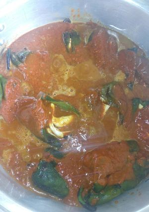 Una foto de Chiles rellenos en adobo sin capear a la mario, s