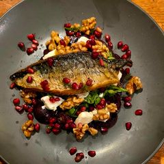A picture of Pan Fried Mackerel, Beetroot & Goat's Cheese Carpaccio, Candy Walnuts, Orange & Dill Vinegarette.