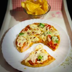 A picture of Wheat flour pizza no oven no yeast.
