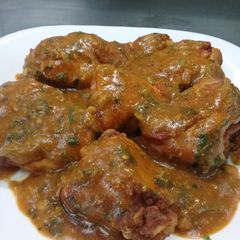A picture of Grilled mouth watering chicken in Coconut dhania sauce.