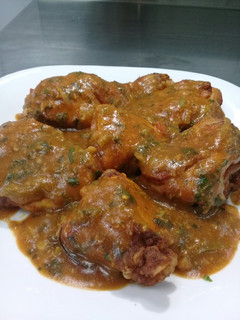 A picture of Grilled mouth watering chicken in Coconut dhania sauce.