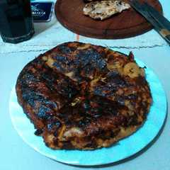A picture of Tortilla de cebolla y morrón.