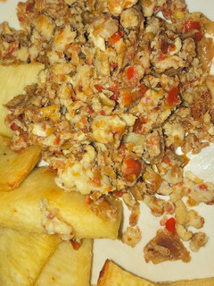 A picture of Non tomato egg Sauce & fried yam.