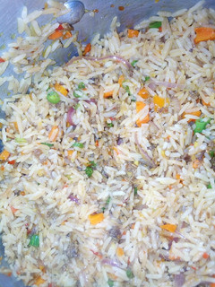 A picture of Brown rice with mince meat and pepper chicken.