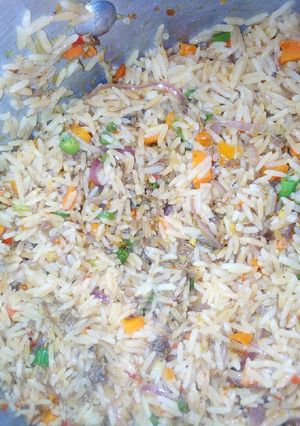 A picture of Brown rice with mince meat and pepper chicken.