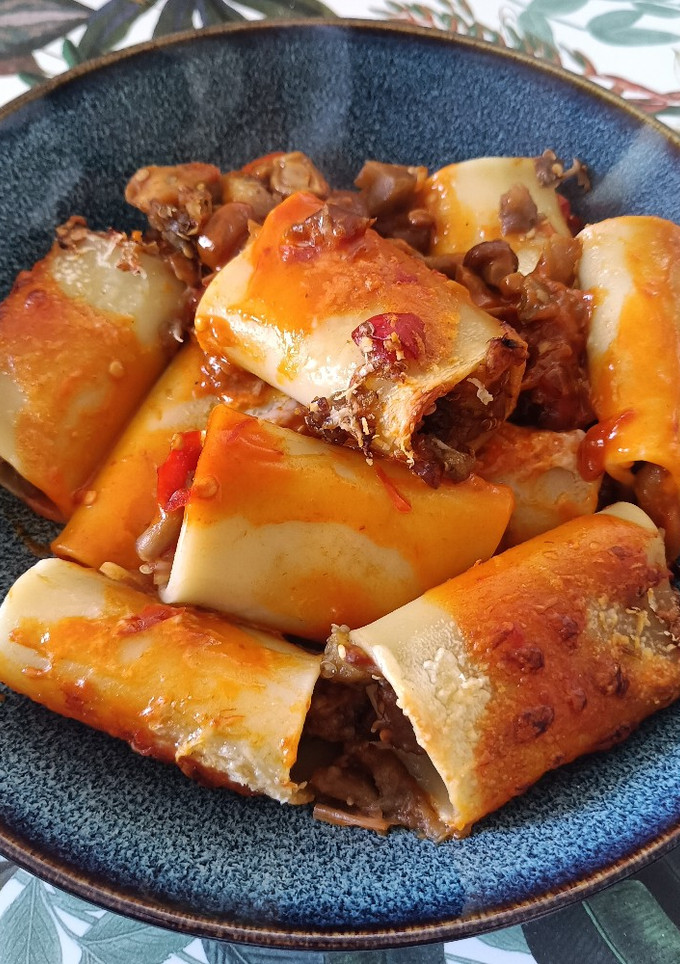 Una foto de Paccheri rellenos de berenjena y nameko