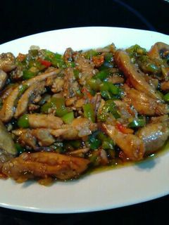 Una foto de Contra muslos de Pollo al Wok