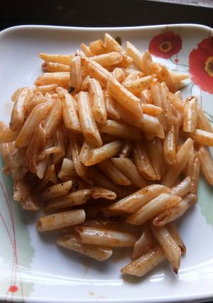 A picture of Plain ketchup Penne Pasta Italian.
