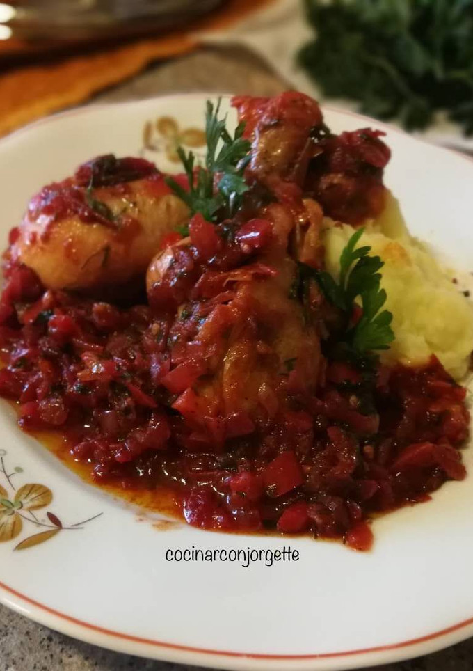 Una foto de Jamoncitos de pollo con tomate caramelizadas